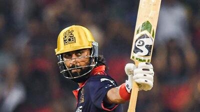 Royal Challengers Bengaluru's Krunal Pandya celebrates his half-century in the IPL match against Mumbai Indians at Raipur’s Shaheed Veer Narayan Singh International Stadium on Sunday. (ANI)