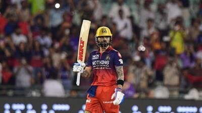 Royal Challengers Bengaluru's Virat Kohli celebrates his century during the Indian Premier League cricket match between Royal Challengers Bengaluru and Kolkata Knight Riders in Raipur, India on Wednesday. (AP)