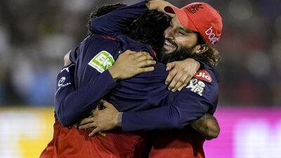 Royal Challengers Bengaluru skipper Rajat Patidar (R) celebrates with teammates after beating Mumbai Indians at Chhattisgarh on Sunday. (PTI)