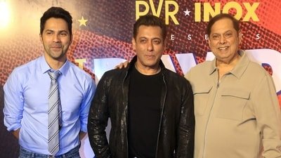 At the event, Salman Khan kept it effortlessly stylish in a black T-shirt paired with a leather jacket and denims. (PTI) At the event, Salman Khan kept it effortlessly stylish in a black T-shirt paired with a leather jacket and denims. (PTI)