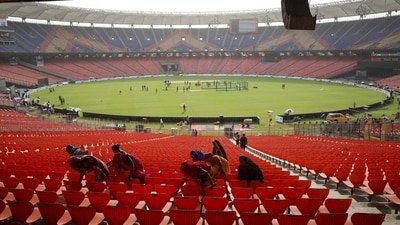 Support staff sweeps the stands ahead of the IPL final between RCB and GT in Ahmedabad on Sunday. (HT_PRINT)