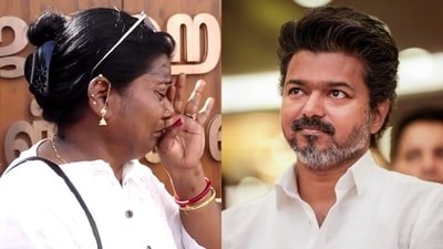 A TVK supporter and Vijay fan broke down outside the Jawaharlal Nehru Indoor Stadium. (PTI)