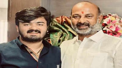 <p>Bandi Bhageerath Sai with Father Bandi Sanjay Kumar</p> 'All are equal before law': Union minister Bandi Sanjay 'hands over' son to police in POCSO case