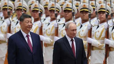 Russia's Putin gets red carpet welcome in China; high-stakes tea meeting with Xi in focus