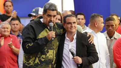FILE - Venezuela's President Nicolas Maduro, left, and Alex Saab stand together during an event marking the anniversary of the 1958 coup that overthrew dictator Marcos Perez Jimenez, in Caracas, Venezuela, Jan. 23, 2024. (AP Photo/ File) <b>Maduro’s ‘bag man’ sent to US as Venezuela deports Alex Saab in dramatic U-turn</b>