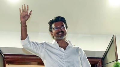 Tamilaga Vettri Kazhagam (TVK) President Vijay waves to the crowd from his father's residence as his party leads during vote counting for the Tamil Nadu assembly elections, in Chennai on Monday. (ANI Video Grab) (ANI Video Grab)