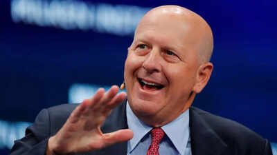 Goldman Sachs CEO David Solomon says the bank will keep hiring thousands of interns and graduates despite AI fears, pushing back on warnings of an entry-level jobs apocalypse on Wall Street. Speaking on Bloomberg's Odd Lots podcast, Solomon said out-of-school hiring may "contract a little" over three years, with 2,400 to 2,500 interns joining this year. He flagged training—not headcount—as the bigger challenge under Goldman's AI-led OneGS 3.0 overhaul.<br />Word count: 75. Goldman Sachs CEO David Solomon, who calls AI causing mass unemployment fears as overblown, says: Bank will continue to…