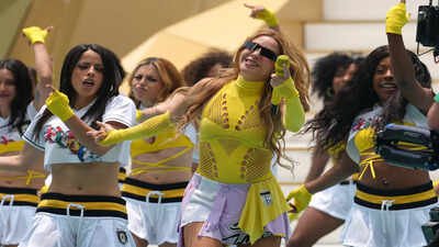 Shakira keeps dancing as World Cup staff rush her off field in viral ceremony video