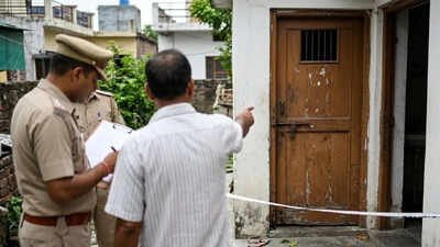A shocking case of domestic violence has emerged from Dehradun. A 32-year-old woman endured 10 months of confinement in a toilet. (Representative AI image) Dehradun shocker: Woman locked in toilet for 10 months, assaulted by in-laws after twins' birth