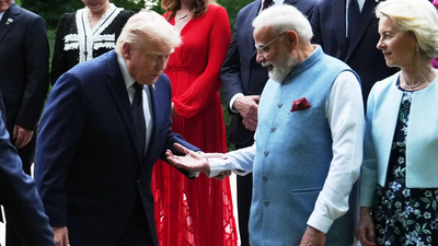 Image: AP PM Modi meets Trump after 16 months, with a handshake, not a hug