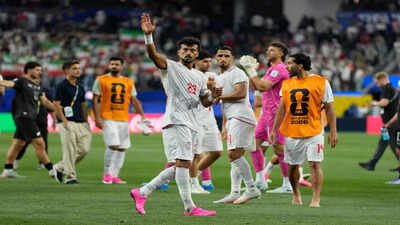 Iran's Ramin Rezaeian (23) waves to fans after the World Cup Group G match against New Zealand in Inglewood, near Los Angeles. (AP Photo) Beautiful game, ugly World Cup: Several teams face brunt of US paranoia, oppressive security