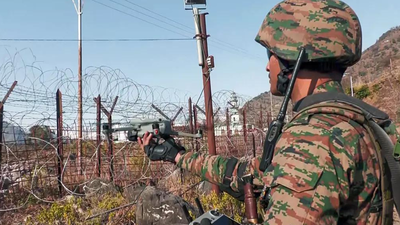 Pakistani national detained after crossing the LoC in J&K’s Kupwara district last week has been repatriated Pak man who crossed LoC sent back, handshakes mark handover