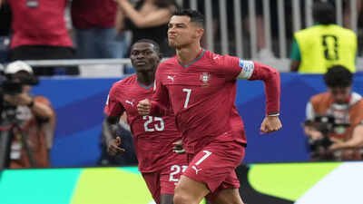 Portugal's Cristiano Ronaldo (7) celebrates after scoring the opening goal of his team during the World Cup Group K soccer match between Portugal and Uzbekistan in Houston, Tuesday, June 23, 2026. (AP Photo/Eric Gay) Cristiano Ronaldo ends 60-year wait, breaks Portugal World Cup record with historic double against Uzbekistan