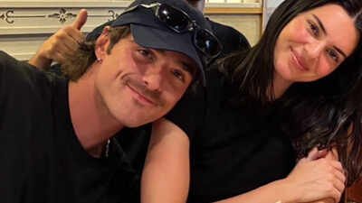 Kendall Jenner and Jacob Elordi walk hand-in-hand at Brisbane airport after meeting actor's mother - PICS