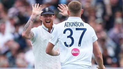 England's Gus Atkinson, right, celebrates with captain Ben Stokes after bowling out New Zealand's Matt Henry to win the Test match between England and New Zealand (AP Photo/Kirsty Wigglesworth)