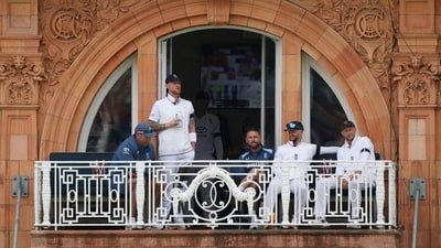 Ben Stokes, Ben Duckett, Joe Root, head coach Brendon McCullum, and assistant coach Marcus Trescothick spectate the match from the Lord's prayer dressing room balcony (Action Images via Reuters)