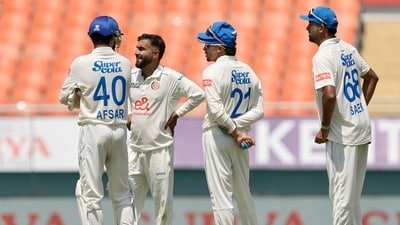 Afghanistan's captain Hashmatullah Shahidi waits with his teammates (AP Photo/Ashwini Bhatia)