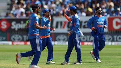 India's players celebrate the wicket of Ireland's Ross Adair during the second T20I. (AP)