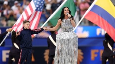 Katy Perry performs during the Parade of Nations before the FIFA World Cup 2026 Group D match between USA and Paraguay at Los Angeles Stadium on June 12, 2026 in Los Angeles, California.  

(Photo by JAMIE SQUIRE / GETTY IMAGES NORTH AMERICA / Getty Images via AFP)