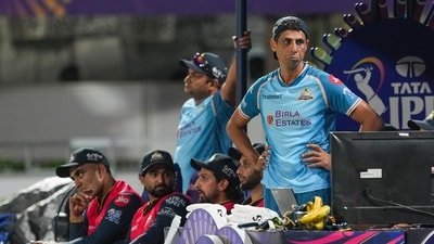 Gujarat Titans' head coach Ashish Nehra, right, reacts during an Indian Premier League (IPL) 2026 game. (PTI)