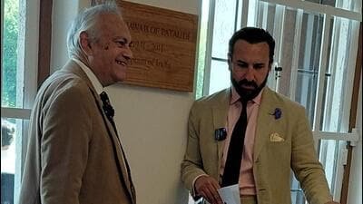 Saif Ali Khan at the unveiling with the plaque in the background. (HT)