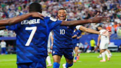 France's Ousmane Dembele (7) celebrates with Kylian Mbappe (10) after scoring their third goal during the World Cup Group I soccer match between France and Iraq in Philadelphia, Monday, June 22, 2026. (AP Photo/Derik Hamilton) France vs Iraq, FIFA World Cup Match Result: Les Bleus win 3-0 as Mbappé scores brace on 100th cap and Dembele nets first World Cup goal