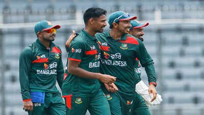 Bangladesh's Mustafizur Rahman, center, celebrates with teammates (AP Photo) History made! Bangladesh seal first-ever ODI series win over Australia