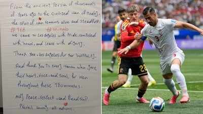 Iran team's handwritten note (left) and Belgium's Alexis Saelemaekers, left, challenges Iran's Ehsan Hajisafi during the World Cup Group G football match between Belgium and Iran in Inglewood, California, near Los Angeles, Sunday, June 21, 2026. (AP Photo) 'We came to Los Angeles with pride, competed with honor': Defiant Iran leave handwritten note about 'dignity' after Belgium draw in FIFA World Cup