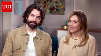 Elizabeth Olsen expecting first child with husband Robbie Arnett; mom-to-be shows off baby bump on day out - Photos