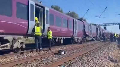 Two trains collide near London, emergency services respond