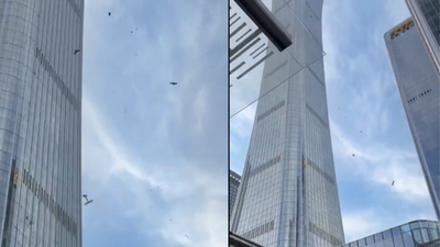 Watch: Car-sized aircraft crashes into Beijing's tallest skyscraper; police seal off area