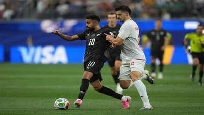 New Zealand's Sarpreet Singh (10) battles for the ball (AP Photo/Andre Penner) Who is Sarpreet Singh? First Indian origin player to start a FIFA World Cup match