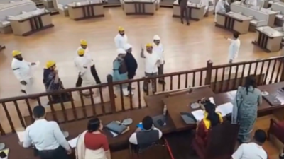 In Pune Municipal Corporation, opposition corporators wear helmets in House citing 'threat' from BJP