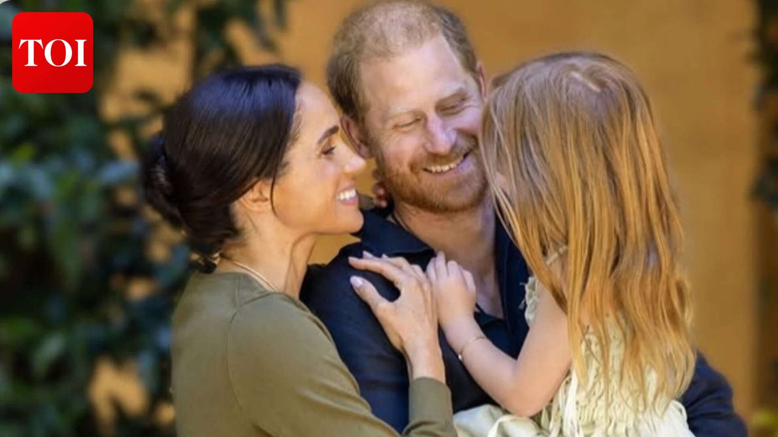 Prince Harry and Meghan Markle with Princess Lilibet