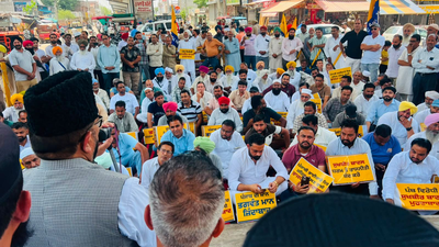 Workers of Aam Aadmi Party stage protest across Punjab accusing opposition of defaming chief minister Bhagwant Mann AAP workers stage protests across Punjab, accuse SAD of defaming chief minister Bhagwant Mann