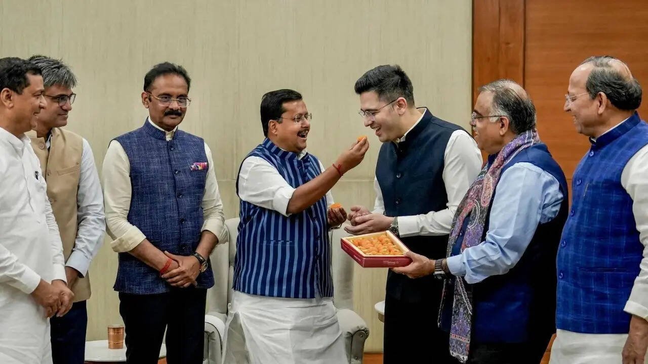 Raghav Chadha and other ex-AAP MPs with BJP president Nitin Nabin