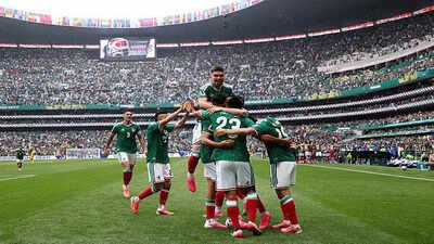 Raul Jimenez #9 of Mexico celebrates with teammates after scoring the team's second goal during the FIFA World Cup 2026 Group A match between Mexico and South Africa at Mexico City Stadium on June 11, 2026 in Mexico City, Mexico. (Photo by Carl Recine/Getty Images) FIFA World Cup 2026 Matches Today: Mexico Face South Korea, Canada Meet Qatar as Four Teams Chase Crucial Points