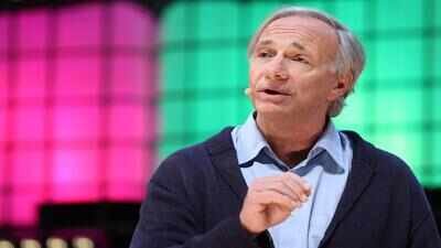 Billionaire Ray Dalio tells Americans from stage at a New York event: The problem with AI companies in the US vs China is …