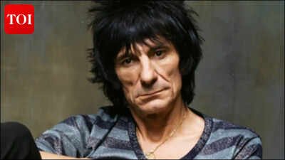 Ronnie Wood asked to repaint his home's main door from pink to black Ronnie Wood has to repaint his GBP 7 million mansion’s main door: Bright pink hue not acceptable as per authorities