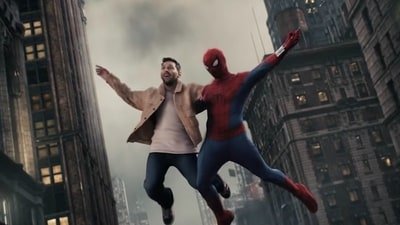 Messi is all smiles as Spider-Man takes him for an epic ride.