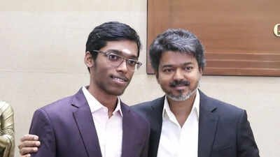 Tamil Nadu CM Vijay with Norway Chess champion R Praggnanandhaa (Screengrab) Watch: Rs 50 lakh reward! Tamil Nadu CM Vijay plays chess with Norway Chess champion R Praggnanandhaa