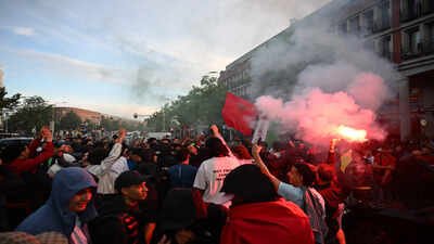 Watch: Moroccan fans clash with Dutch police in The Hague after Morocco knock Netherlands out of World Cup