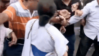 Mamata Banerjee loses cool, slaps TMC worker during protest Mamata Banerjee loses cool, slaps TMC worker during protest; BJP shares video