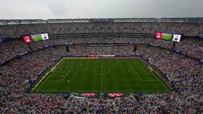FIFA is marketing pieces of World Cup final turf for USD 450, but the initiative has sparked outrage from both fans and players. The turf's poor quality has come under fire for its irregular texture.(AP Photo) World Cup 2026: FIFA puts World Cup final pitch up for sale at a whopping Rs. 42,989 per piece