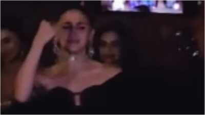 Alia Bhatt danced to 'Maahi Ve' at BFF Akansha Ranjan Kapoor's sangeet in Mumbai, wearing a purple silk saree. Akansha, marrying filmmaker Sharan Sharma on July 11, has chosen a private court marriage over a grand wedding. Alia was last seen in 'Alpha' and will next star in 'Love & War'. Alia Bhatt sets the dance floor on fire with ‘Maahi Ve’ at BFF Akansha Ranjan's sangeet - watch