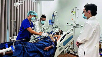 An Indian tourist, who was rescued from a speedboat that capsized, receives treatment at a hospital in Phu Quoc, Vietnam Vietnam boat capsize: Holiday updates for kin back home turn into news of death