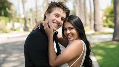 Mithun Chakraborty's daughter Dishani Chakraborty shared unseen engagement photos with fiancé Myles Mantzaris, shot in Los Angeles. The romantic pictures show the couple embracing on a palm-lined street. Dishani expressed excitement about marrying Myles and thanked photographer Catherine Marie Taylor. No wedding date has been revealed, but preparations may be underway. Mithun Chakraborty's daughter Dishani Chakraborty says 'I can't wait to marry you' in UNSEEN engagement pictures with fiancé Myles Mantzaris from LA