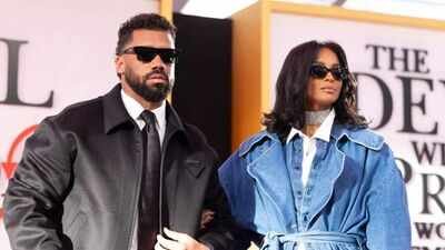 Russell Wilson and Ciara have reportedly lowered the asking price of their Rancho Santa Fe estate from $54.9 million to $45 million as they prepare for life after the NFL. The luxury property features a private football field, recording studio, wellness center, and guesthouse. The move follows Wilson's retirement and transition into broadcasting with CBS Sports, making an East Coast base more practical for the couple. Russell Wilson and Ciara make a major post-retirement move as they relist their $45 million California estate at a lower asking price