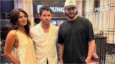 Priyanka Chopra, shooting for SS Rajamouli's 'Varanasi' in Hyderabad, enjoyed a movie night with husband Nick Jonas and co-star Mahesh Babu at AMB Cinemas. On the Jonas Brothers' podcast, she revealed Rajamouli personally cast her 14 months ago. 'Varanasi', set post-asteroid apocalypse, follows Rudhra's quest, with Priyanka playing Mandakini. Amid ‘Varanasi’ shoot, Priyanka Chopra and Nick Jonas meet Mahesh Babu for movie night in Hyderabad - See Photo
