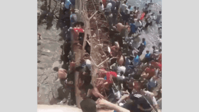 Footage shows chaos at Spain-Morocco border as thousands try to swim across; 34 dead